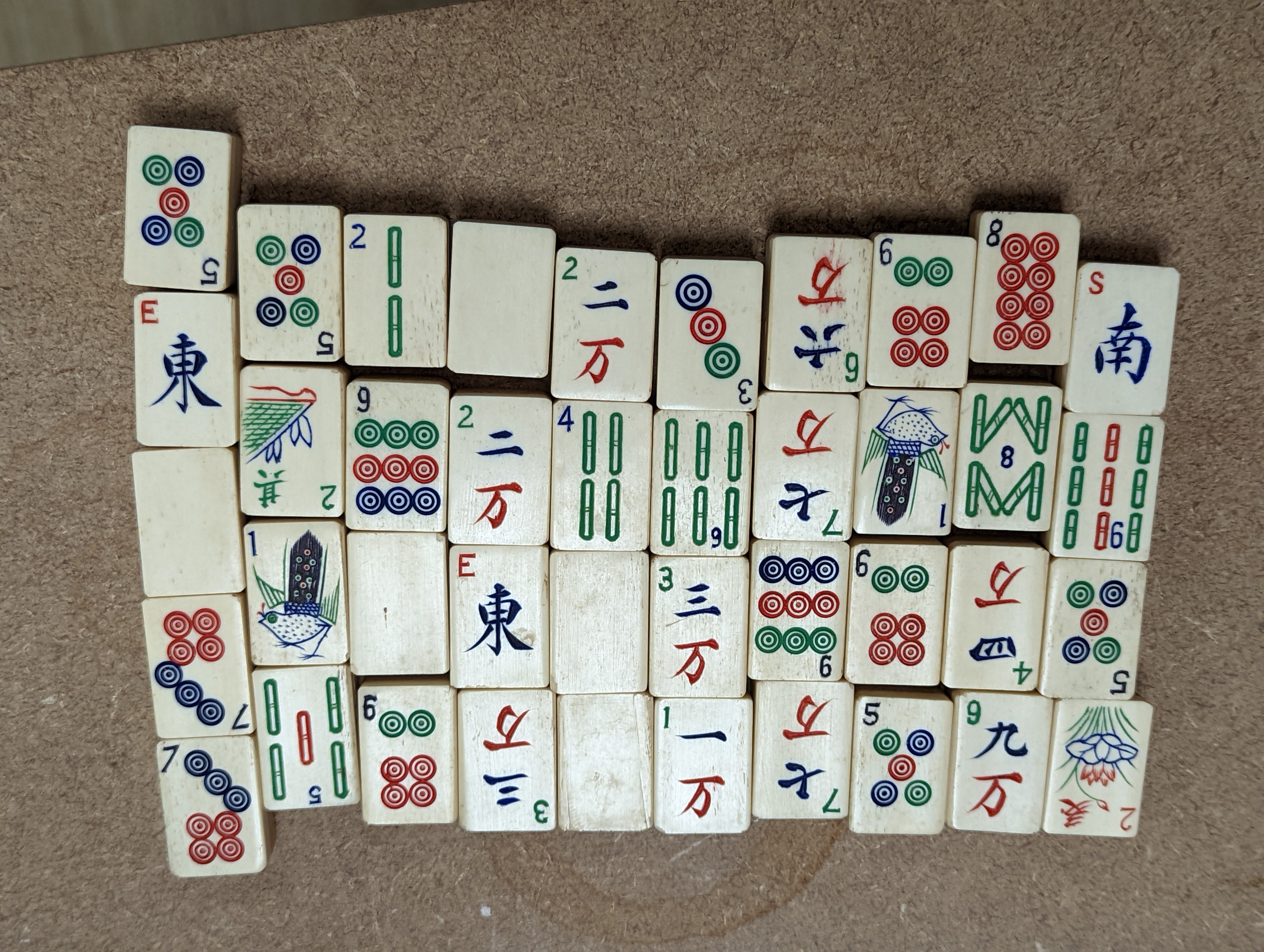 A Mah Jong set in wooden box, 17 cms high.